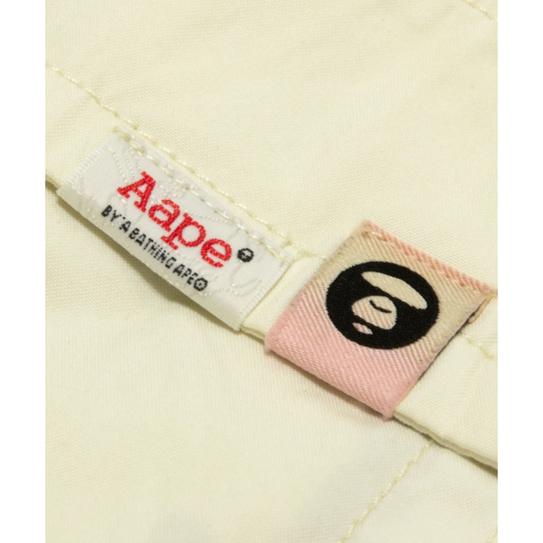 에이프 AAPEUNVS 문페이스 팬츠 아이보리 AAPPTMD610XXQIVA